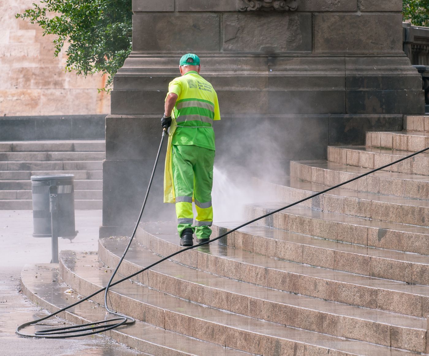 Pressure-washing the exterior steps of a commercial building