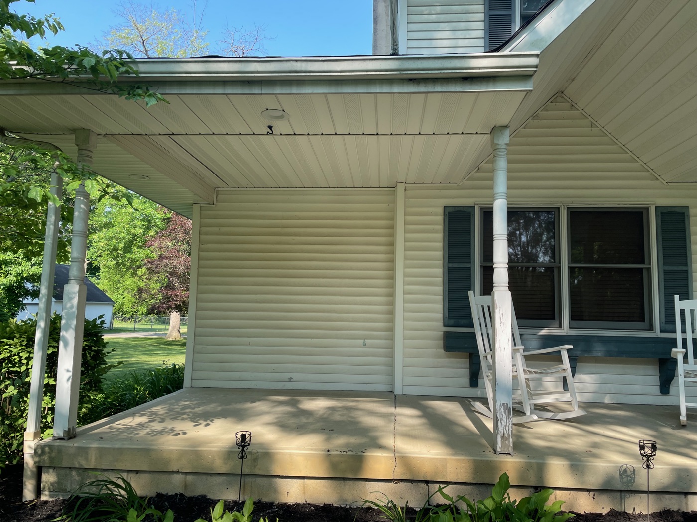 Farmhouse porch and soffit soft-washed